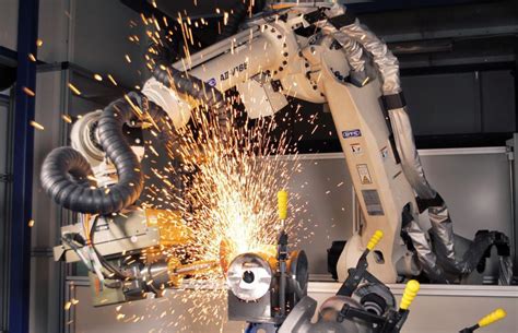 grinding robot versus cnc machine